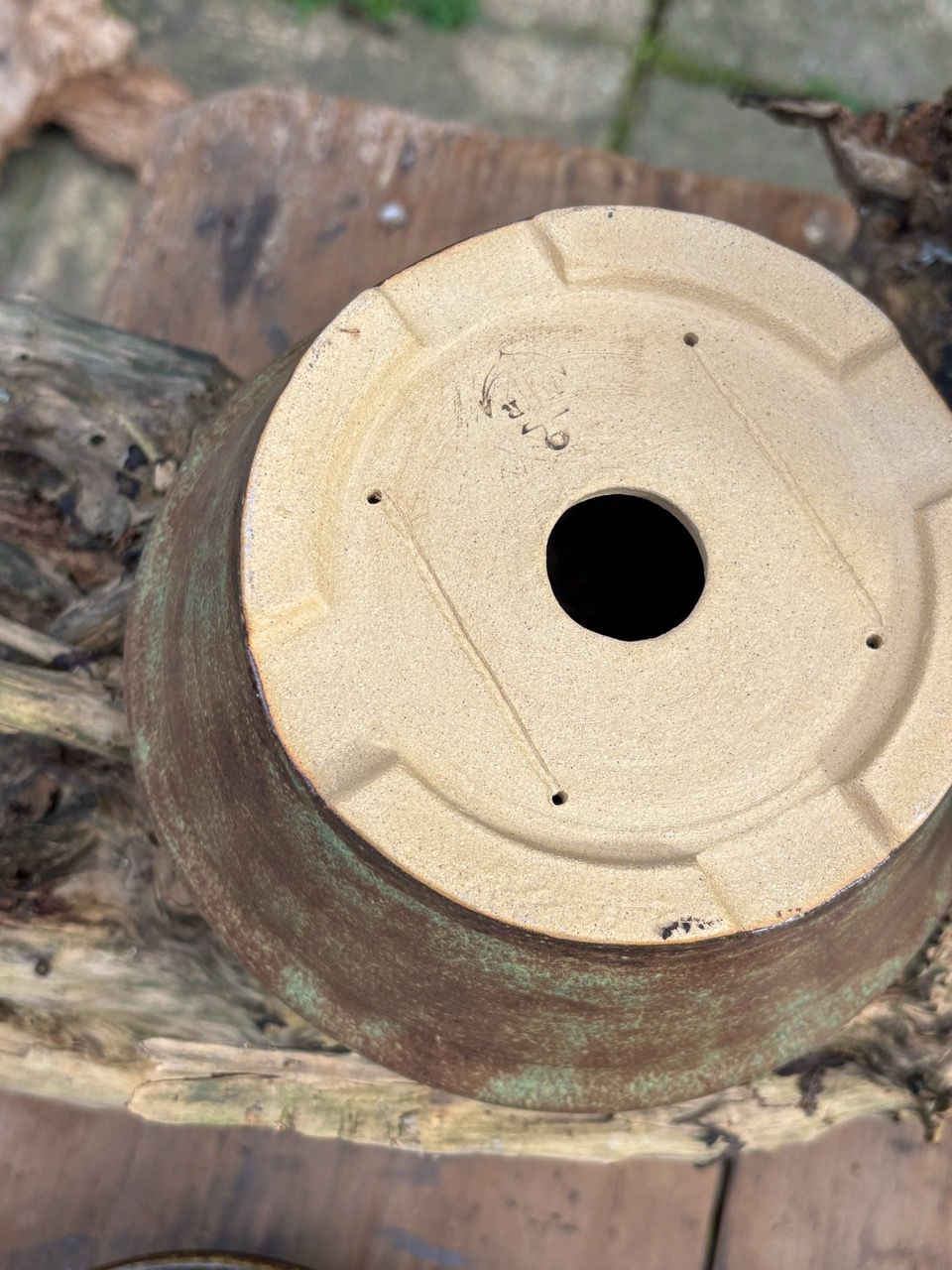 Small handmade bonsai pot with speckled brown and green glaze