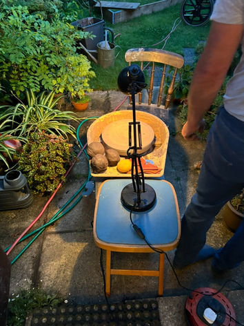 Image of a pottery wheel outdoors 