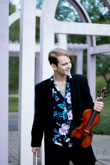 kostia violin lukyniuk eastman school of music skylar marks photographer levitation photography oahu maui hawaii graphic design rochester new york beach portrait headshot ukraine