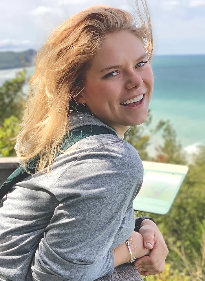 Photo of woman smiling at the camera