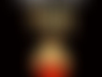 Steamboat on red water before pyramid shape. Agatha Christie's "Death on the Nile" text in gold on black background, creating mystery.