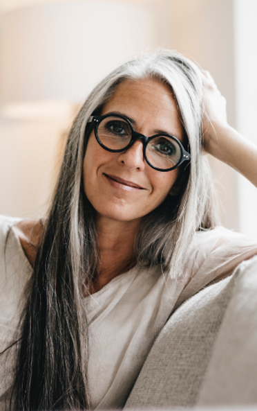 Healthy older woman representing NAD+ therapy benefits for energy, mental clarity, and healthy aging at Prestige Regenerative Medicine