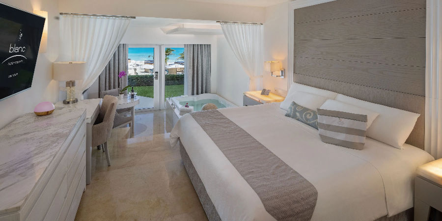 Le Blanc Cancun oceanview suite with double whirlpool — AAA Five Diamond adults-only all-inclusive resort for anniversary couples