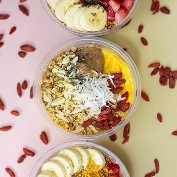 Smoothie bowls with granola and fruit toppings at MOFI Energy Bar Harlingen