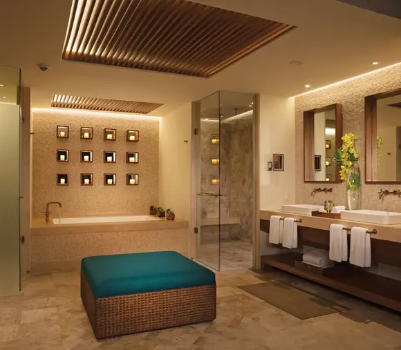 Spacious spa-style bathroom with walk-in shower at Secrets Maroma Beach
