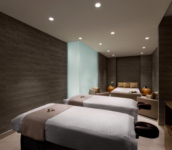 Spa treatment room with side-by-side massage beds at Hard Rock Hotel Los Cabos