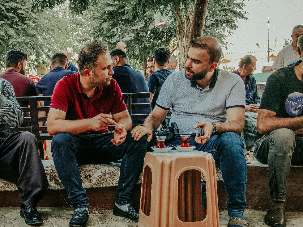 native turkish speakers talking and drinking tea