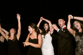 Kam Hunt teaching people how to line dance in Fort Worth at Bass Hall at an event where he was the DJ and emcee.