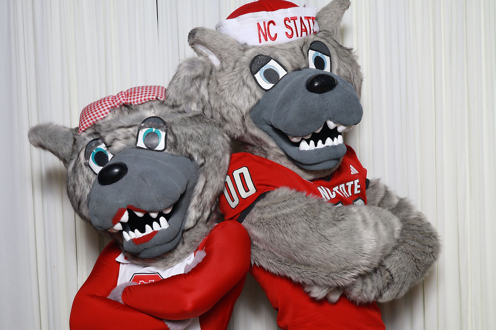 NC State mascots posing at an A&A Booths corporate photo booth event in Raleigh NC