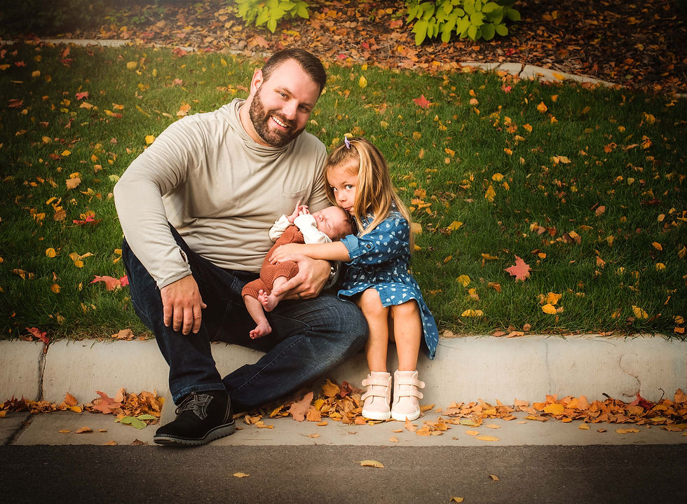 Dad and Newborn Son With Daugher