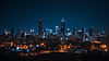 stunning-view-city-skyline-night-with-tall-buildings-illuminated-against-dark-sky.jpg
