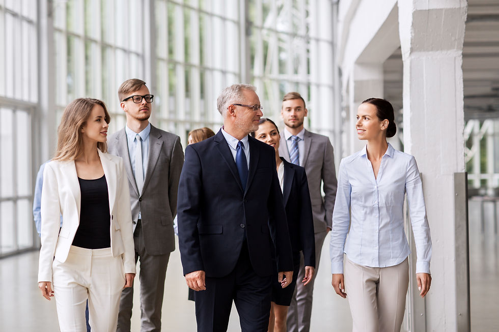 business-people-walking-along-office-building (3).jpg