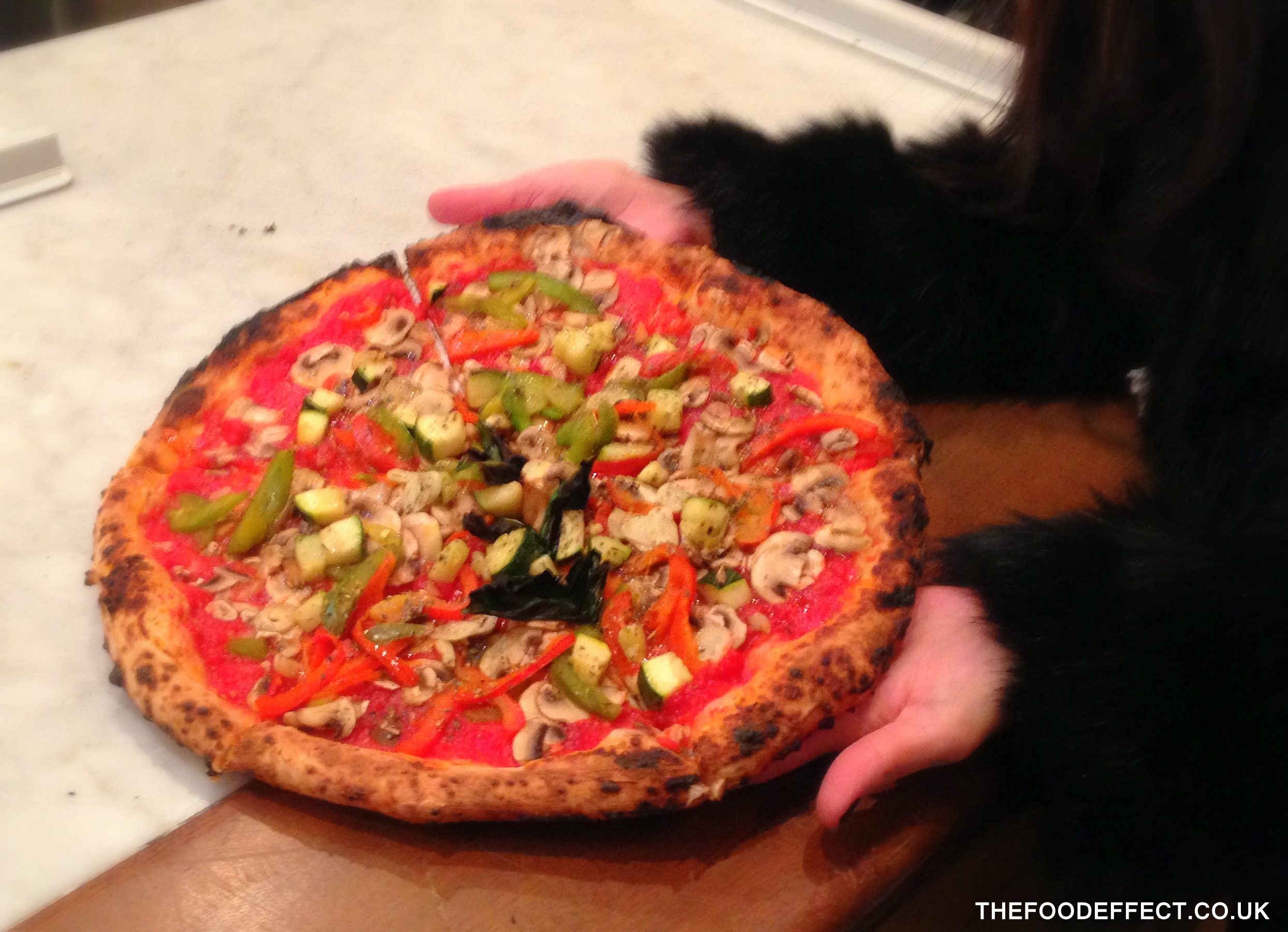 Holding my most delicious Italian pizza!
