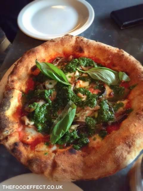 Whole-wheat pizza with minimal cheese and veggies... delish!