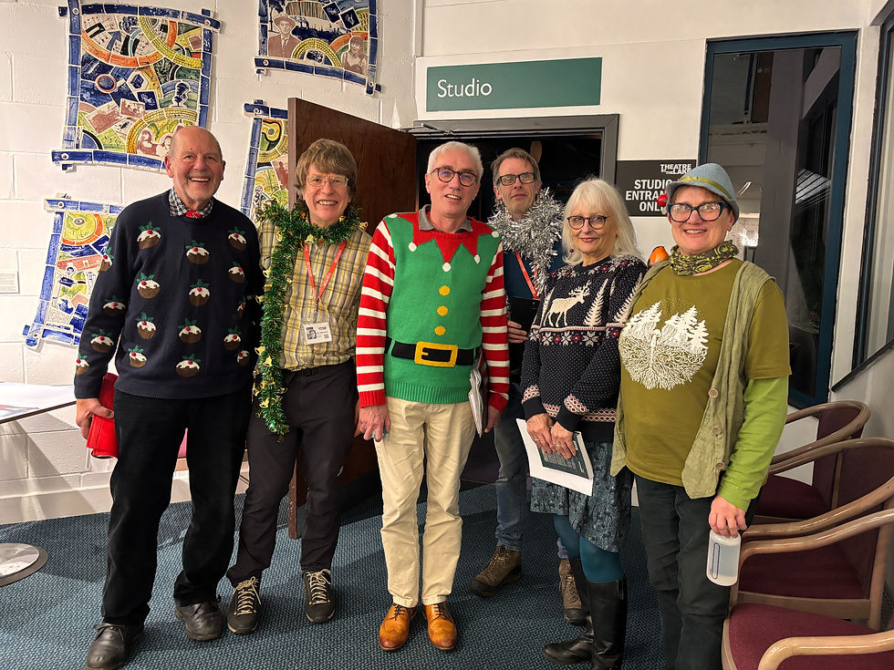 In the Christmas spirit: (from left) John Crouch, Mike Willoughby, Alan Cleaver, Dave Felton, Sue Allan and Carolyn Francis.