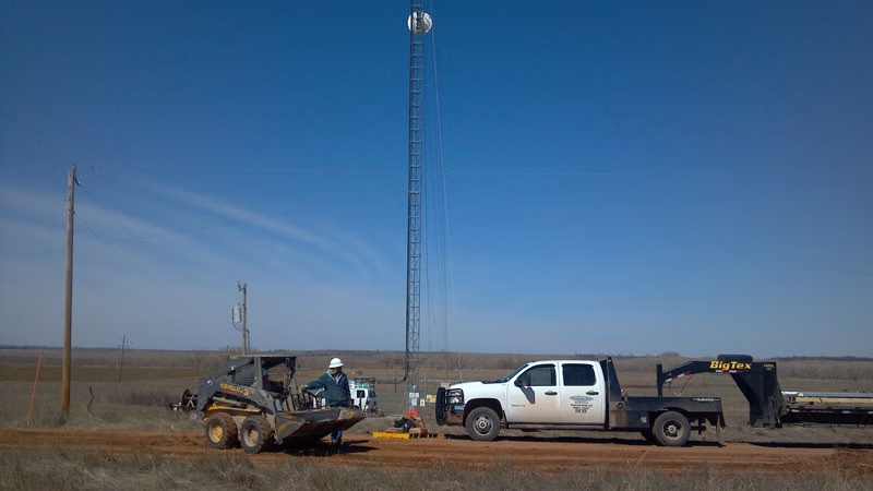 on a job site View of the K0UO RSI Corp. - Radiofrequency Safety International antenna 1200 acres antenna test range site at the worlds largest ham radio station with the largest highest gain DX, contest antennas