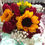 Miniatura: Arreglo de rosas rojas y girasoles