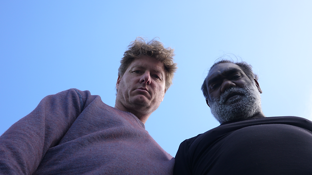 TWO MEN looking down FRANK AND FRANK .png