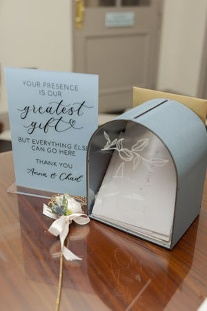 Wedding card box sign. Acrylic sign painted with pale blue, with black hand-lettering and custom hand-painted illustrations.

Photo credit: IC Photographics.
