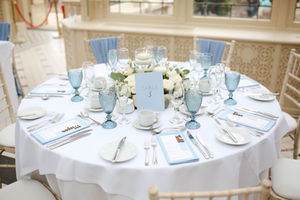 Table Numbers in pale blue, with complimenting guest menus 

Photo credit: Ellie White Photo