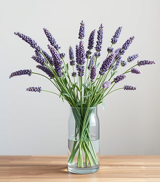 Lavender in a vase on a table with cool neutral background