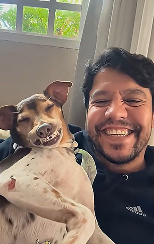 dog and owner smiling