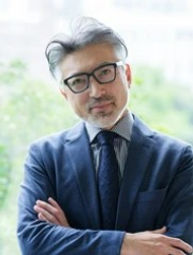 attentive older man in a suit