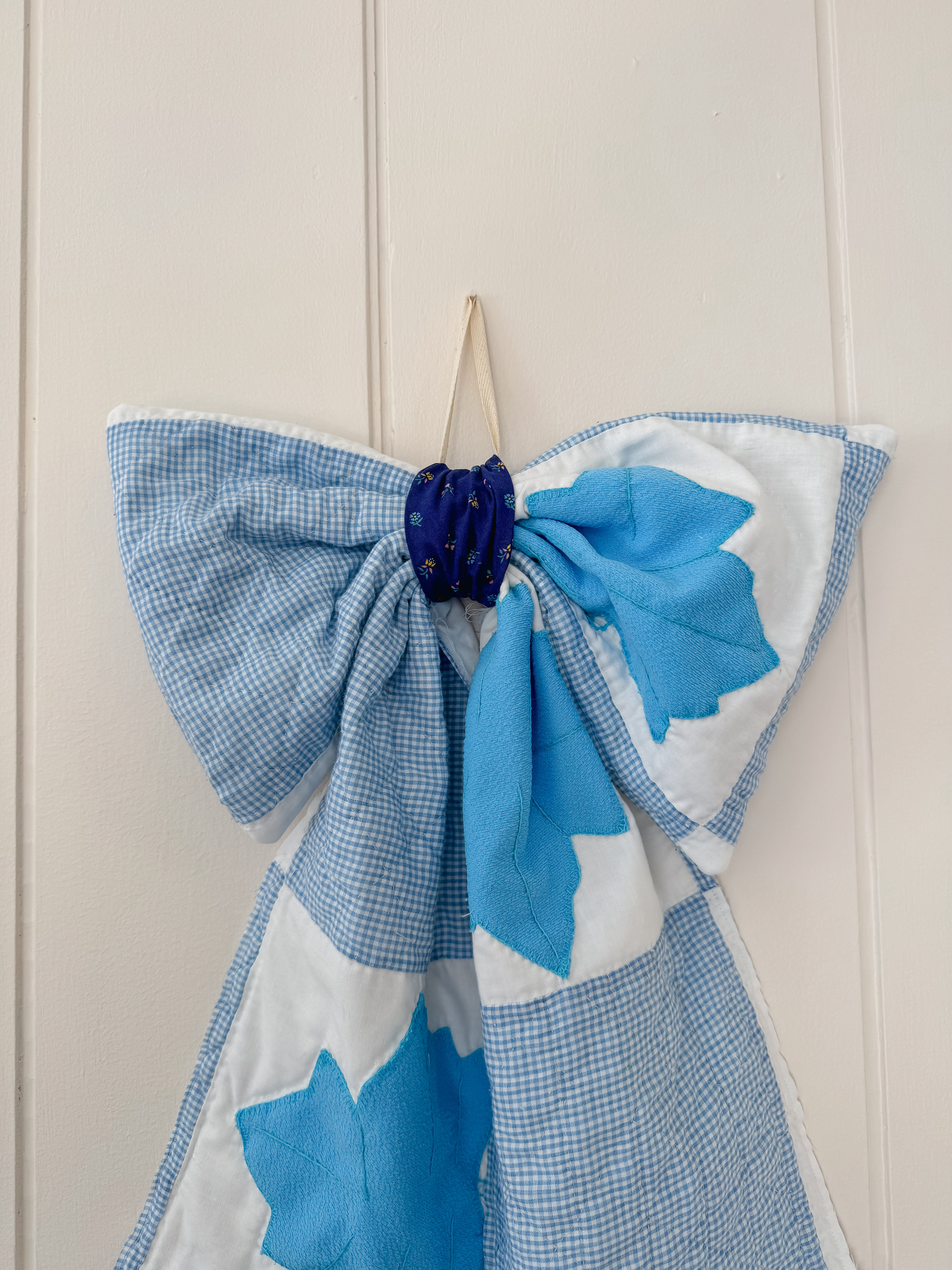 Blue bow (navy center)