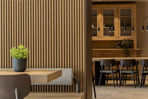 Italian-design furniture in a cozy, sophisticated breakfast and tasting room in Valdobbiadene, Italy.