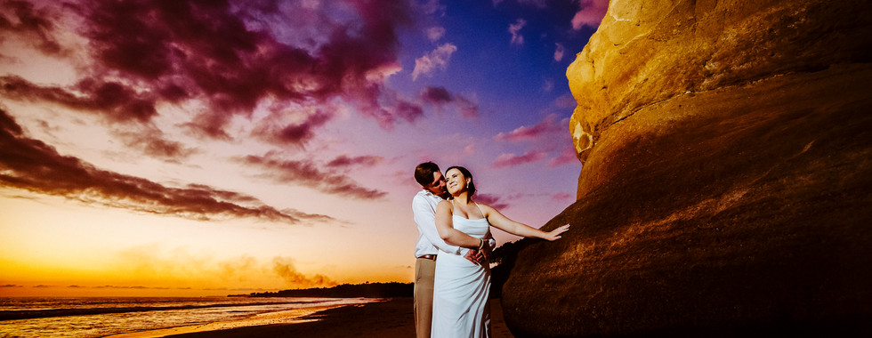 Romantic sunset wedding photo: Calli & Sean embrace on beach Marival Armony Punta de Mita