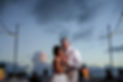 Bride and father dancing at sunset wedding reception