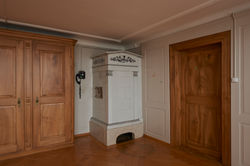 Kachelofen Wohnung 101