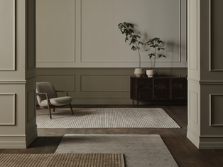 Dizajnerska preproga priznane blagovne znamke z brezčasnim slogom in vrhunskimi materiali.