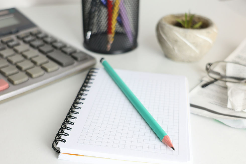 Business loan, overdraft or line of credit: Calculator and notebook for comparing cash flow needs