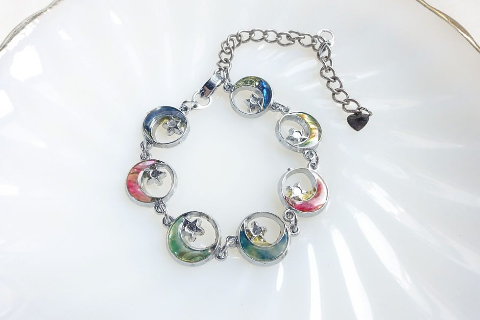 Abalone multi color star and moon silver tone bracelet