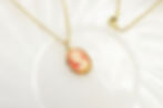 Coral oval cameo pendant necklace