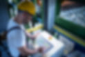 factory-worker-monitoring-industrial-machines-production-remotely-control-room.jpg