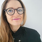 A picture of the owner of ElectroGlow Studio looking professional