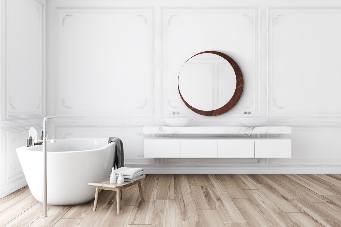 Casali Group Eclipse mirror featuring unique circular form and marble-effect finish for modern interior focal points