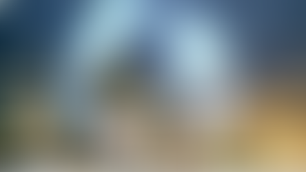 abstract photo of a globe in front of a night skyline