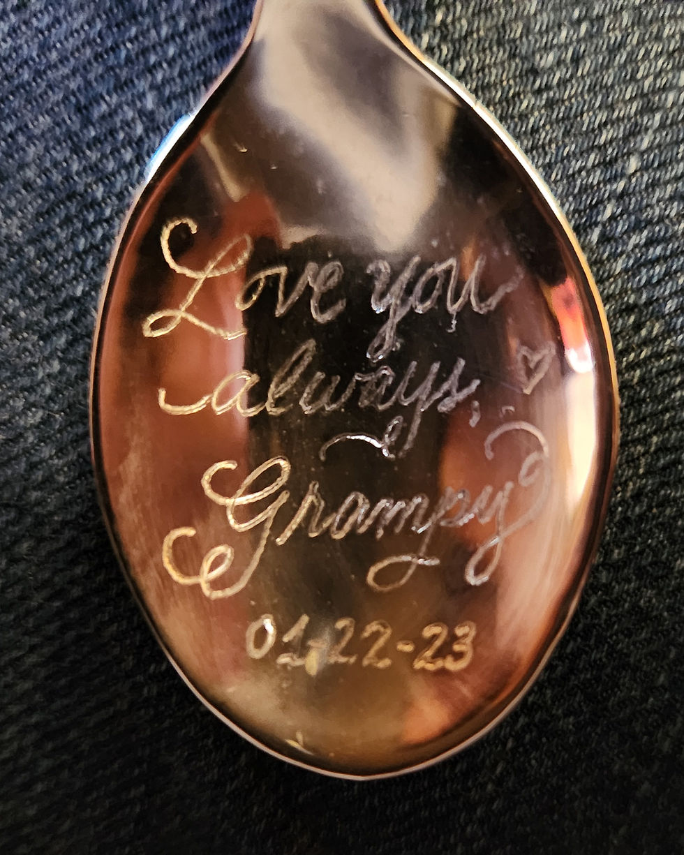 Hand engraved silver baby spoon