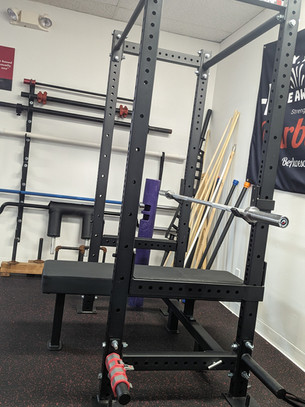 Titan dedicated bench press rack, fat pad, drop down safeties