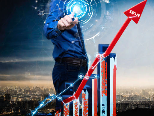 Man in blue shirt interacts with digital interface, pointing at a holographic chart with a red upward arrow. Urban skyline backdrop.
