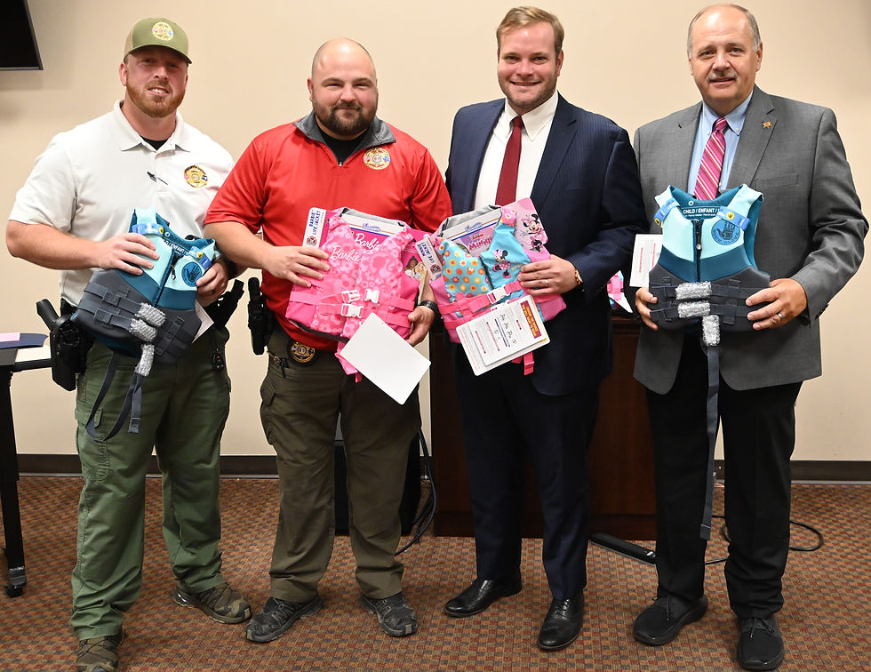 (From L - R: Corporal Billy Lee, Lieutenant Justin Murphy, Andrew Holliday and Sheriff Mike Crenshaw 