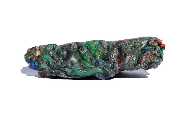 Local plastic recycling process for creating innovative designs, using a wood-burning oven to transform waste into valuable m