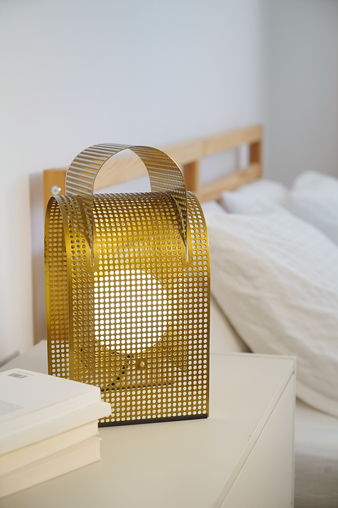 FOLD table lamp featuring a simple yet elegant design, made from sustainable iron and glass materials, showcasing minimalism