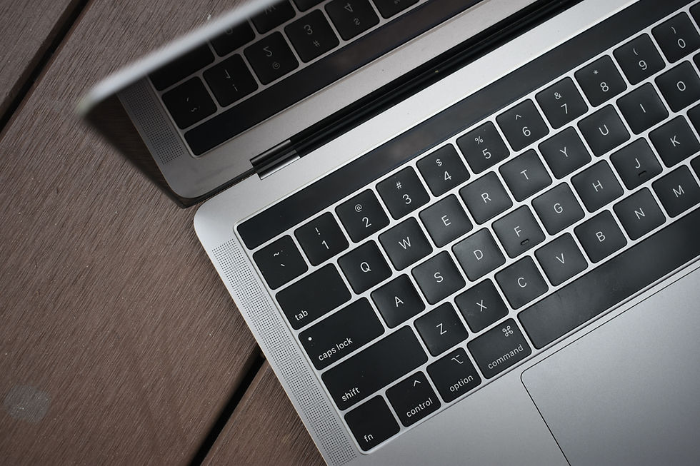 A silver MacBook on a table