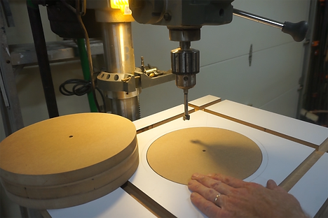 Four sacrificial inserts stacked on the table