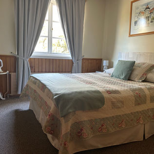 Vista general de la Habitación Matrimonial Fünf en Casa Frau Holle, Frutillar.