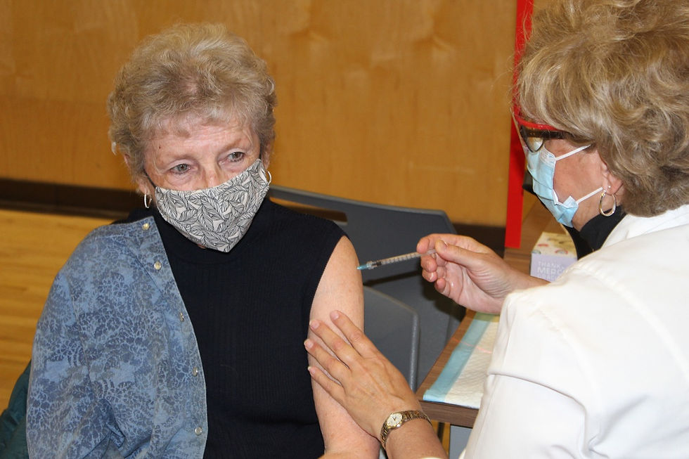 It’s the light at the end of the tunnel for Marguerite Seguin, 85, as she received one of the first doses of the Pfizer COVID-19 vaccine at Centre Wakefield-La Pêche on March 11. Ninety-six residents of the Outaouais were vaccinated on the first day at Centre Wakefield-La Pêche and were registered to receive their second dose on July 2. Stuart Benson photo